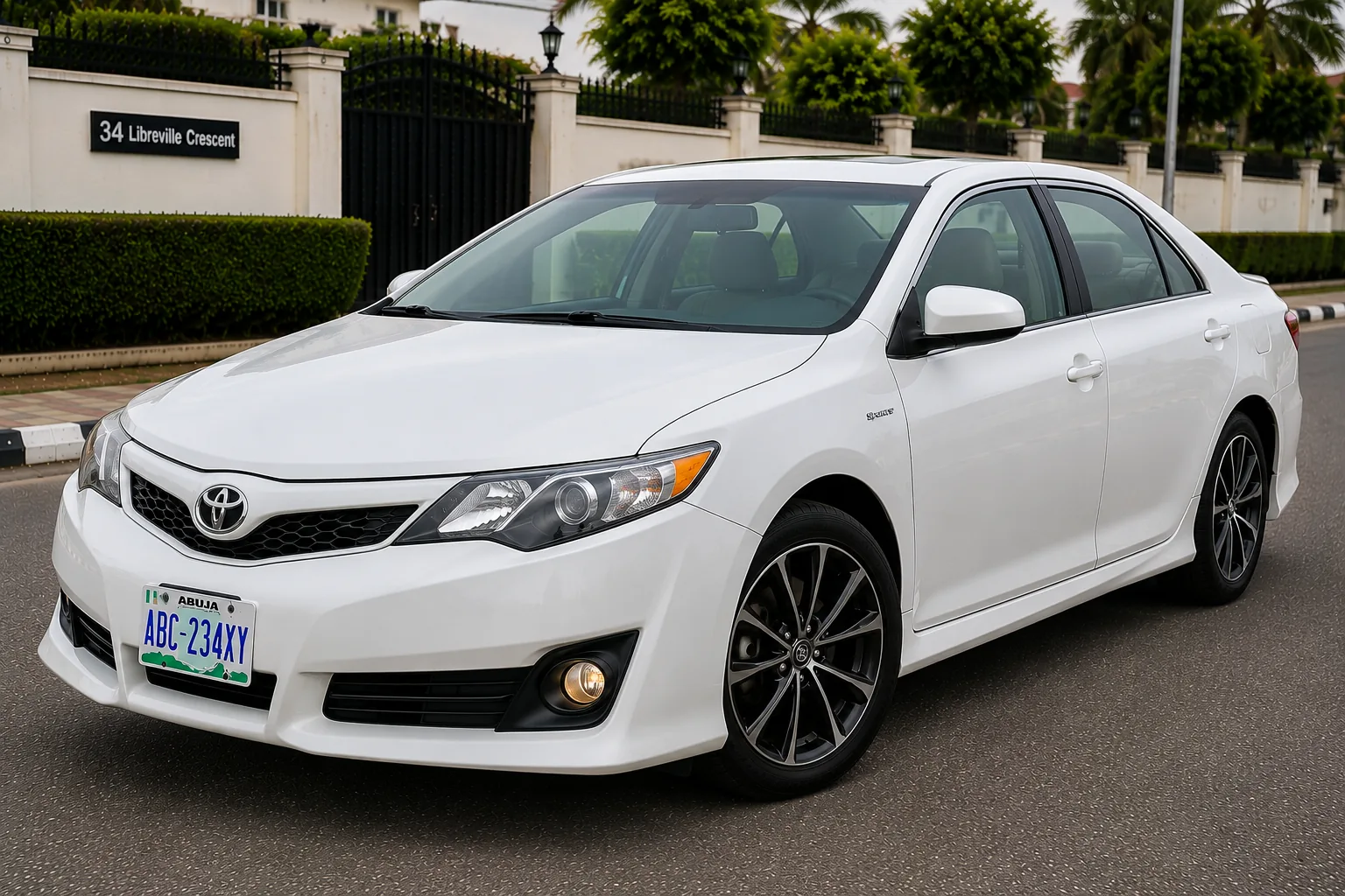 White Toyota Camry 2014 Sport self drive rental Abuja
